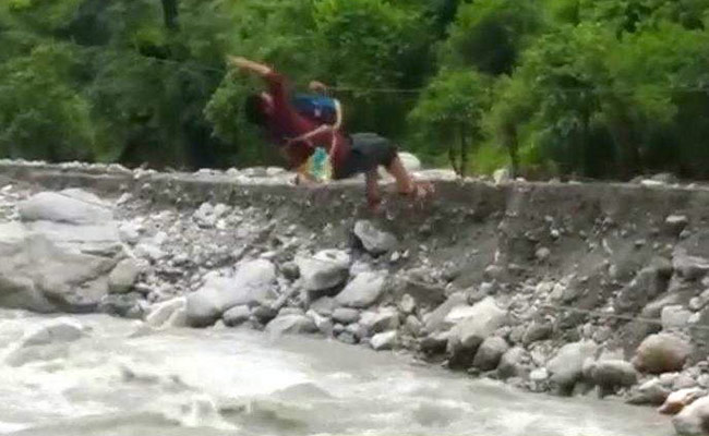 Watch: Teacher Zip-Lines Across Raging River In Uttarakhand To Reach Work