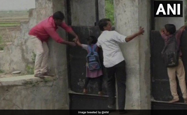 Watch: Kheda Villagers' Daily Stunt To Cross A Broken Bridge For 2 Months