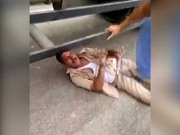 Mob Removes UP Cop's Belt, Thrash Him With It After His Car Hits 2 Bikes Mob Removes UP Cop's Belt, Thrash Him With It After His Car Hits 2 Bikes