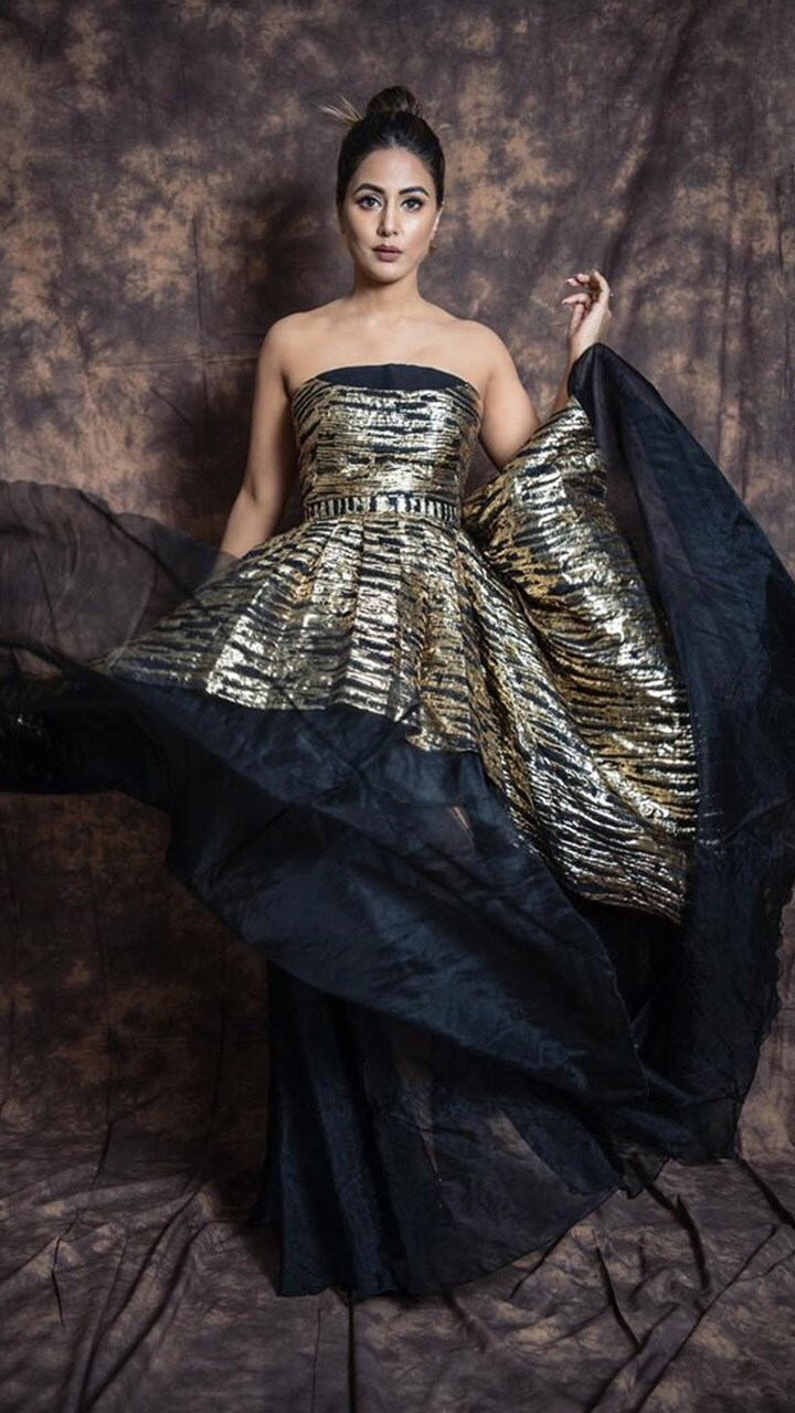 Hina Khan in golden black gown