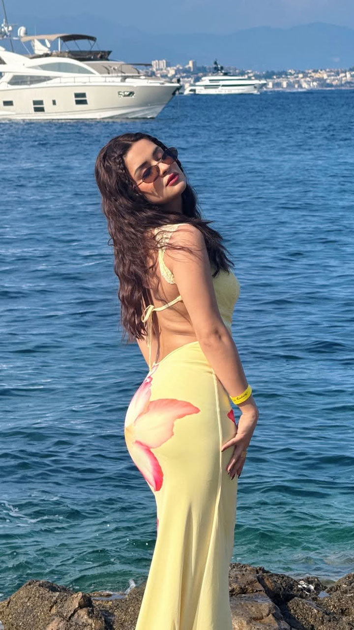 Avneet Kaur shines in a light yellow, form-fitting gown that embodies coastal elegance and carefree summer spirit.