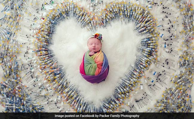 Over 55,000 Shares For This Photo Of Newborn Surrounded By IVF Syringes