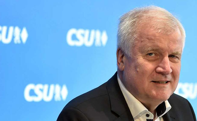 Future Of Merkel Coalition In Doubt As Interior Minister Offers To Resign