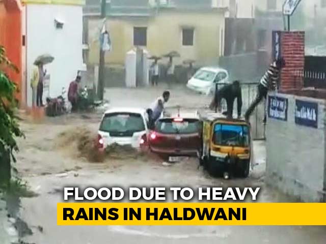 They Managed To Get Out Seconds Before Car Was Washed Away. Watch