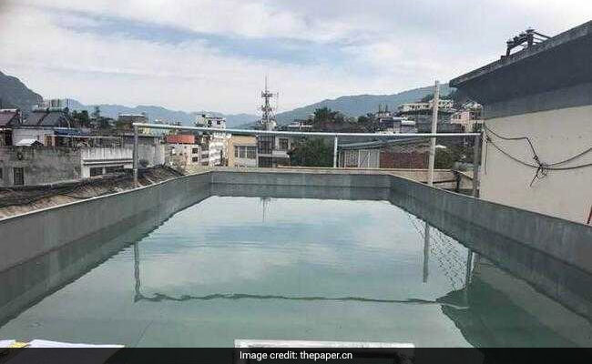 Man Builds Himself Metre-Deep Pool On High-Rise Roof, Wanted To Stay Fit