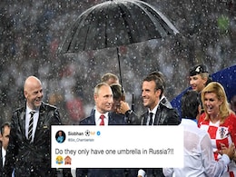 Vladimir Putin's Umbrella Steals The Show At World Cup Final Vladimir Putin's Umbrella Steals The Show At World Cup Final