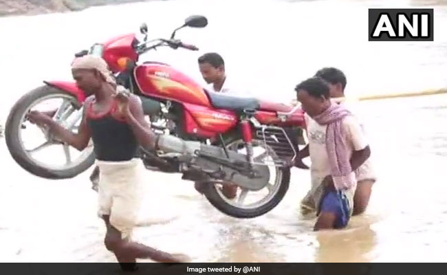 Incomplete Bridge Forces Jharkhand Villagers To Cross River On Foot