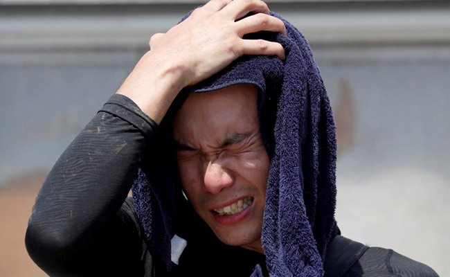 14 People Die As Heatwave Blankets Japan, Rescue Hit In Flooded Regions