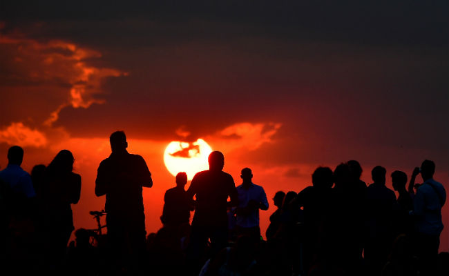 'Blood Moon' Dazzles Skygazers In Century's Longest Eclipse