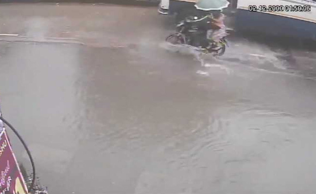 On CCTV, Woman On Bike Dies After Hitting Pothole Near Mumbai