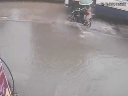 On CCTV, Woman On Bike Dies After Hitting Pothole Near Mumbai On CCTV, Woman On Bike Dies After Hitting Pothole Near Mumbai