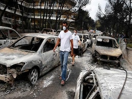 Greek PM's Words Mean Little To Fire-Stricken Ones Standing On Ashes Greek PM's Words Mean Little To Fire-Stricken Ones Standing On Ashes
