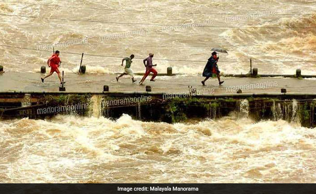 Man Who Ran Across Sinking Bridge With Child Is Hero For Flood-Hit Kerala