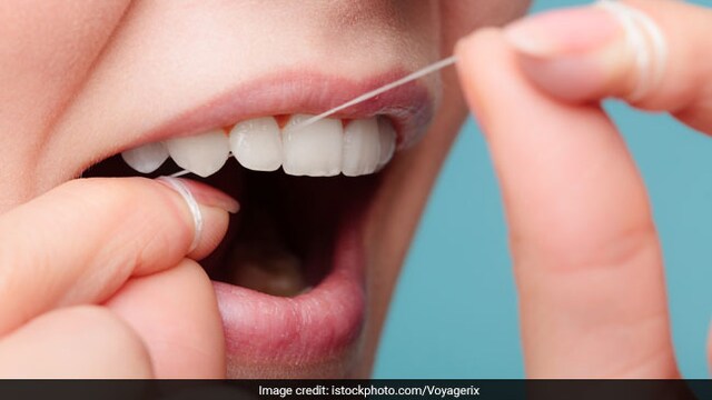 Flossing reaches places your toothbrush can't and extracts bacteria