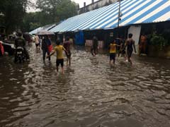 Monsoon Hits Mumbai, Heavy Rain Disrupts Flights, Trains: 10 Updates