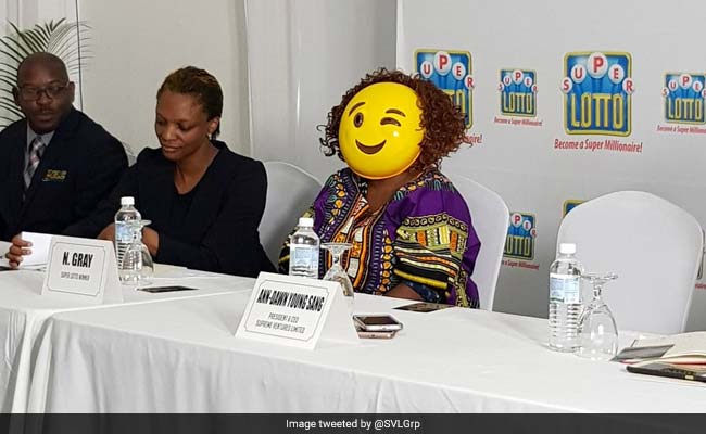Multi-Million Lottery Winner Shows Up In Emoji Mask To Hide Identity