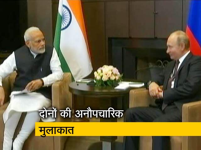 रूसी राष्ट्रपति पुतिन से मिले पीएम मोदी