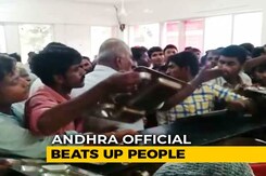Watch: Andhra Official Beats Up People As Mob Swamps 'Anna Canteen' Watch: Andhra Official Beats Up People As Mob Swamps 'Anna Canteen'
