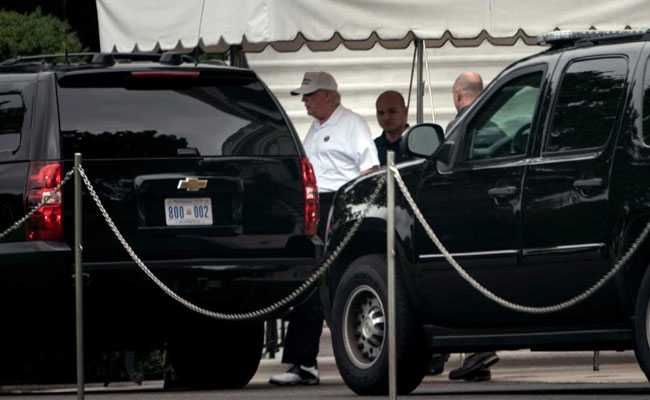 Donald Trump At His Golf Course As John McCain Funeral Underway