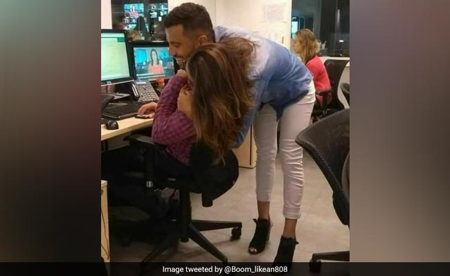 This Pic Of People Hugging Will Leave You Very, Very Confused. Take A Look