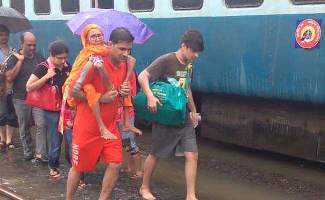 Mumbai Rain Live Updates : Train Services Disrupted, Passengers Stranded