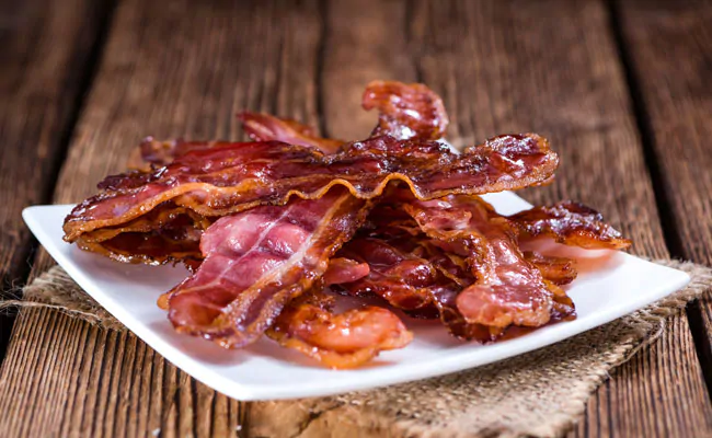 Eating Sausages And Bacon May Up Risk Of Breast Cancer