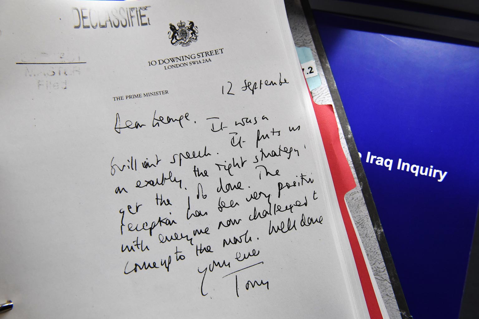 A detail of a declassified handwritten letter sent by the then British Prime Minister Tony Blair, to former US President George W Bush, is seen as part of the Iraq Inquiry Report presented by Sir John Chilcot. (Photo: AP)