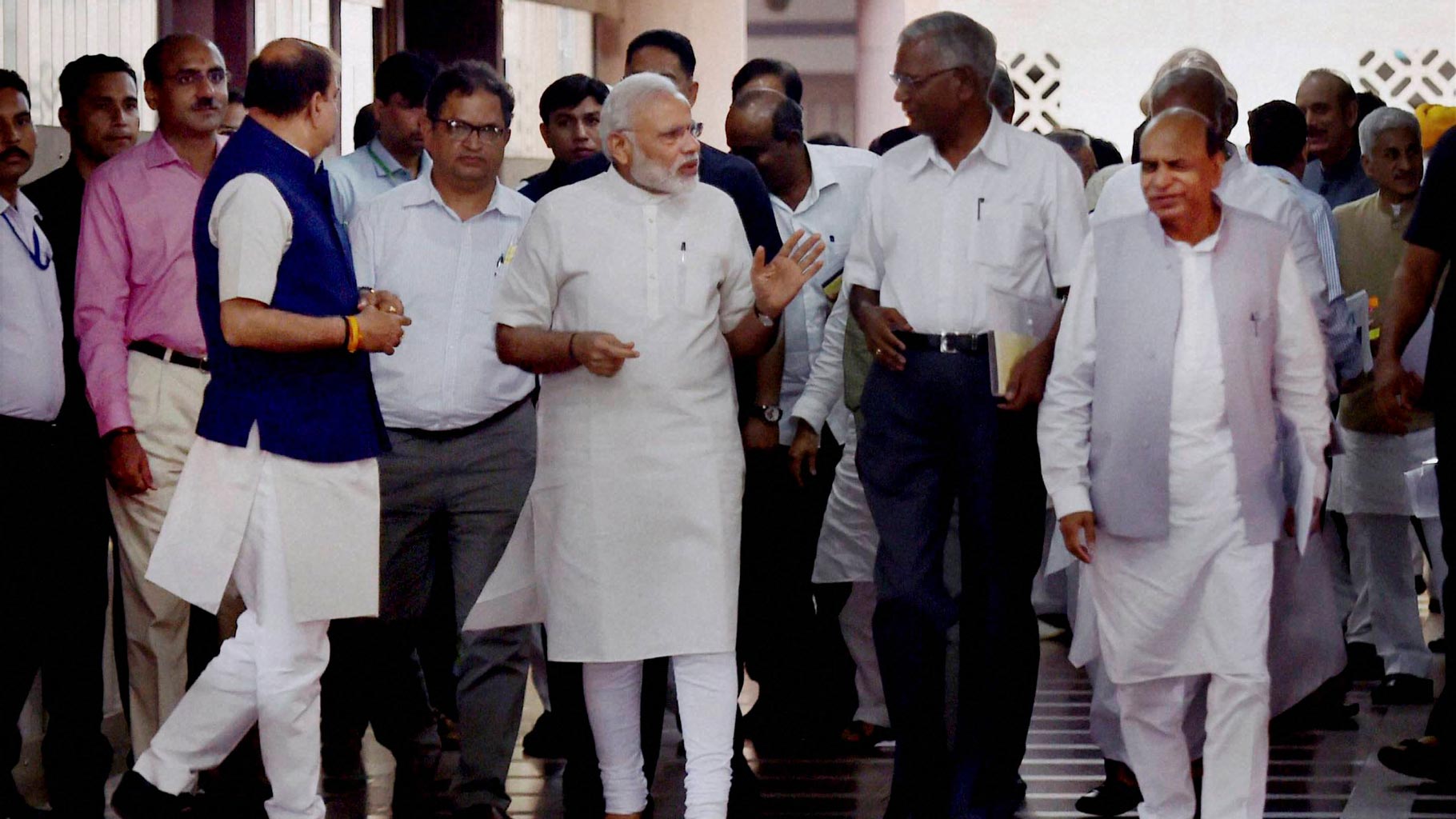 Prime Minister Narendra Modi with NCP Leader DP Tripathi and CPI leader D Raja after an all-party meeting ahead of the monsoon session, at Parliament House in New Delhi on Sunday, 17 July 2016. (Photo: PTI)