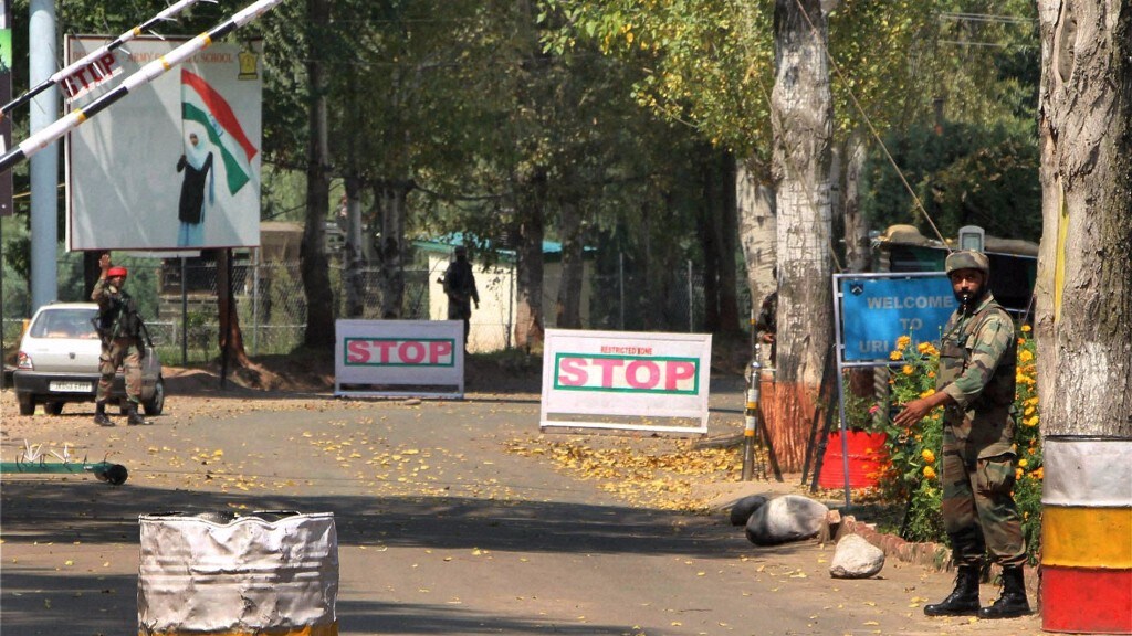 Soldiers guard outside the army base which was attacked suspected militants in Uri, Jammu and Kashmir. (Photo: PTI)