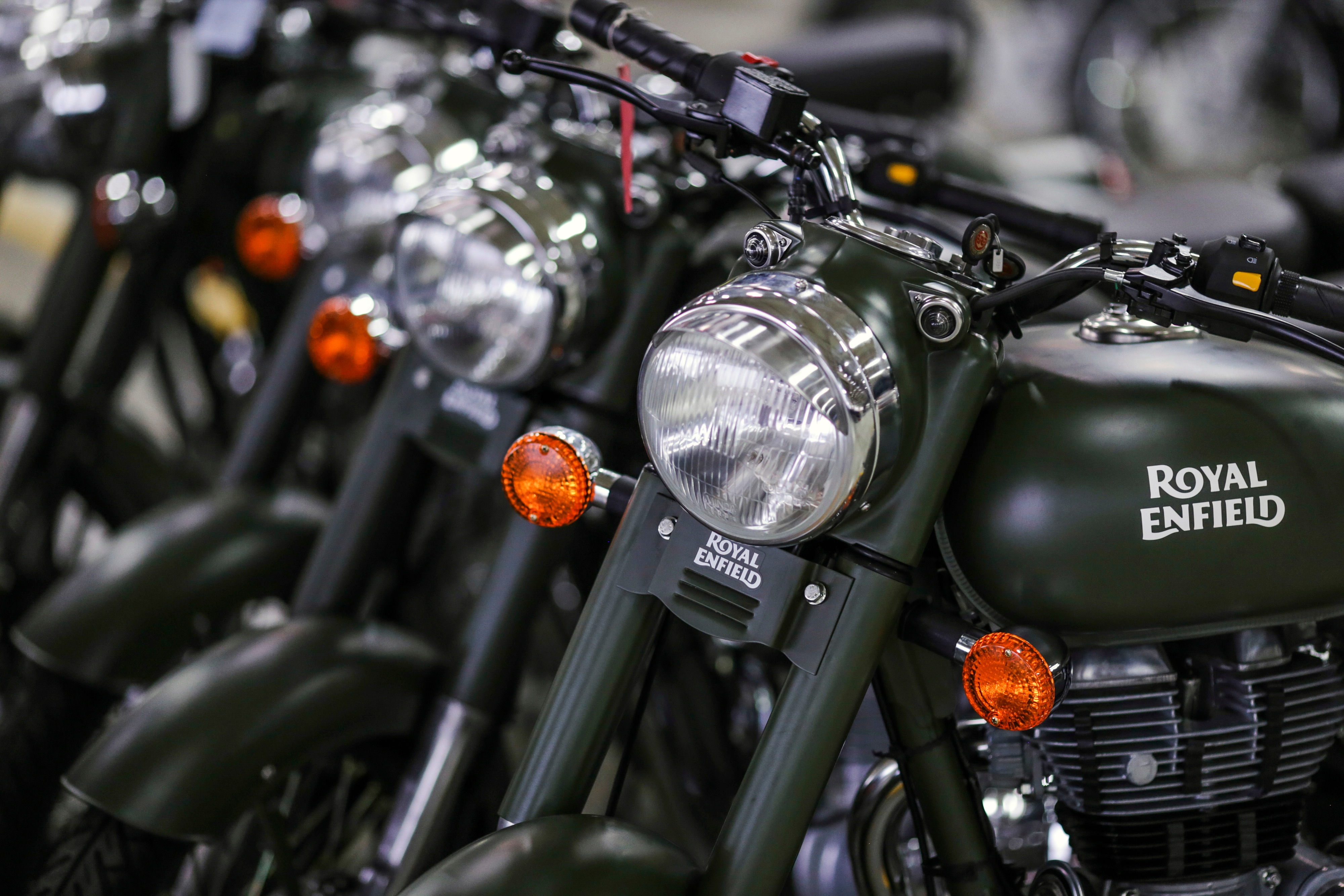 Royal Enfield Motors Classic 350 motorcycles stand on the production line at the company's manufacturing facility in Chennai, India (Photographer: Dhiraj Singh/Bloomberg)