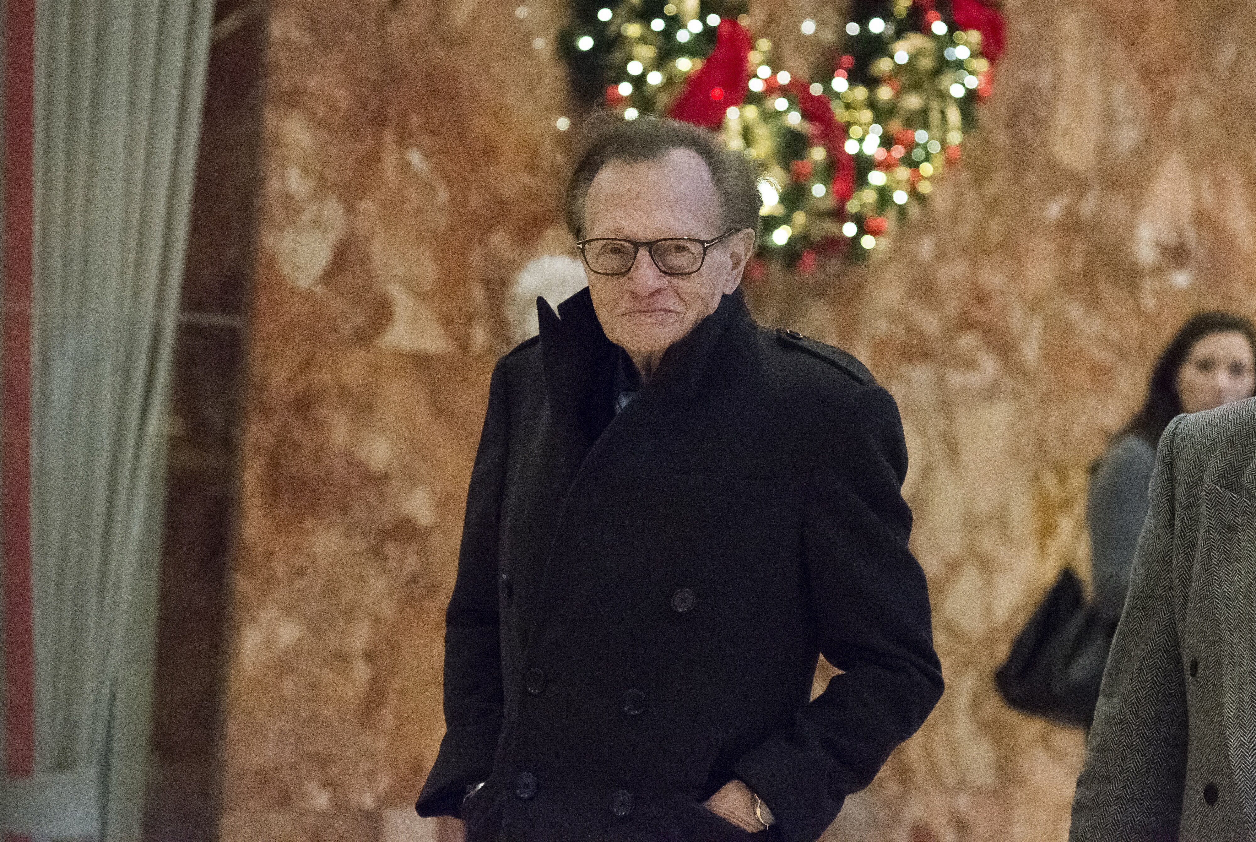 Larry King at Trump Tower earlier this year . (Photographer : Albin Lohr Jones/ via Bloomberg)