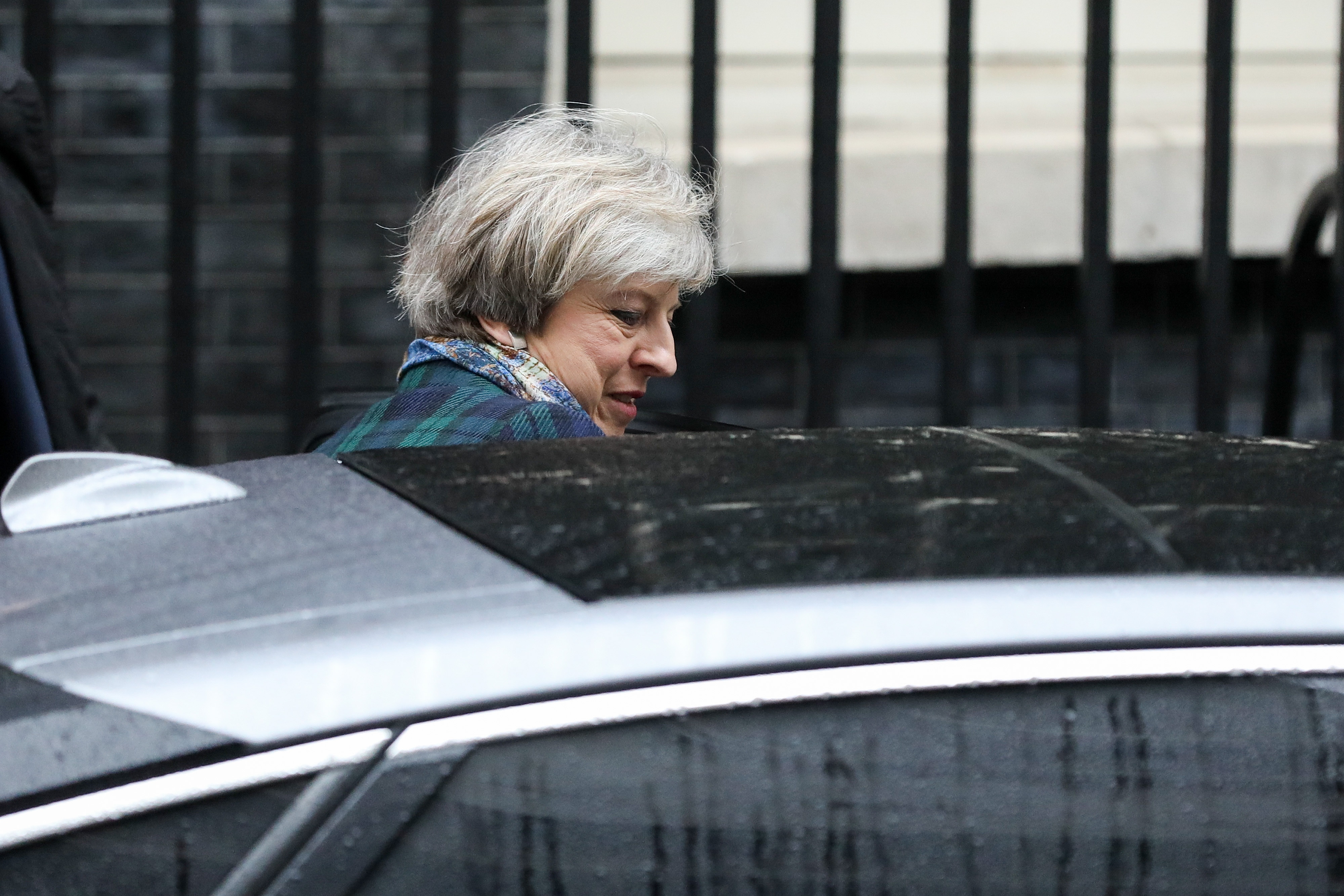 Theresa May, U.K. prime minister, gets into a Jaguar car as she leaves 10 Downing Street in London, U.K., on January 31, 2017. (Photographer: Simon Dawson/Bloomberg)