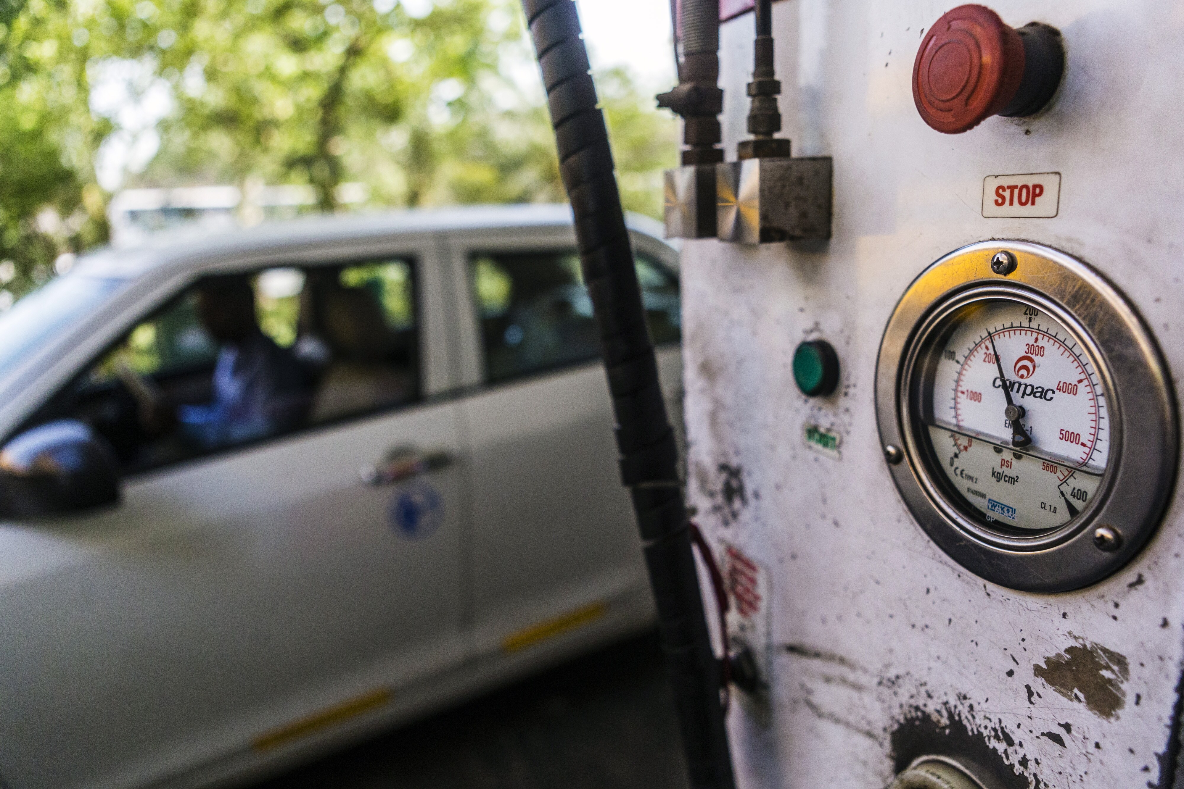 A compressed natural gas (CNG) pressure gauge is seen on a fuel bowser an Indraprastha Gas Ltd. gas station in New Delhi, India. (Photographer: Prashanth Vishwanathan/Bloomberg)