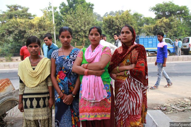 Babita (second from right) has been looking for a job as a tailor for eight months now since the last unit she was employed at shut down post-demonetisation. Every morning, thousands of migrant workers land up at the Noida Hosiery Complex in search of casual jobs. (Source: IndiaSpend)