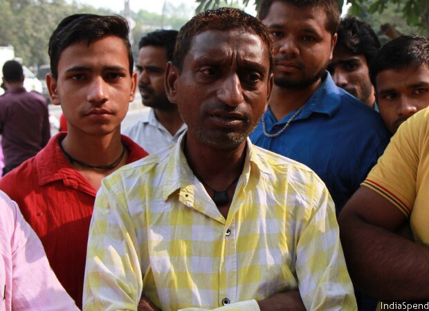 Many workers, like Yadesh Kumar (in yellow), had opened bank accounts to facilitate cheque payments but now find that there are no jobs to give these accounts any meaning. (Source: IndiaSpend)