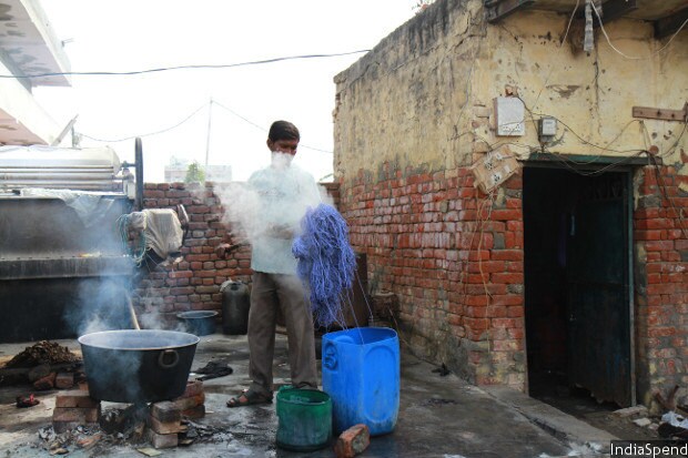 Small feeder businesses like this dyeing unit running out a one room tenement in Nayagaon, off Noida Hosiery Complex, are finding it hard to deal with the complexities of GST. (Source: IndiaSpend)