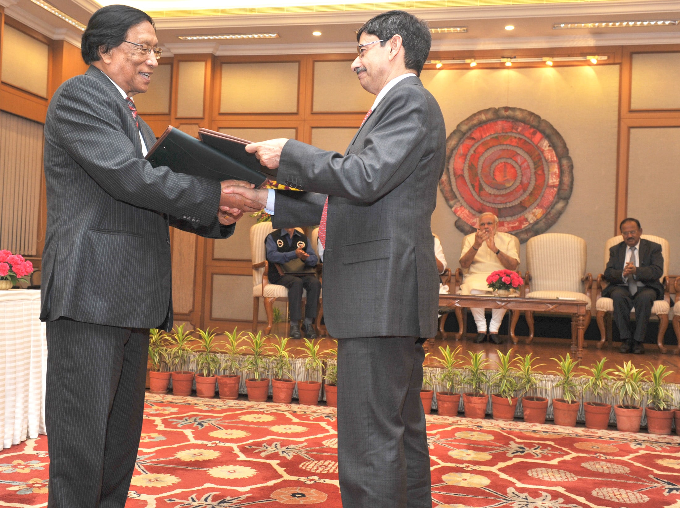 Prime Minister Narendra Modi witnessing the signing and exchange of the peace accord between the Government of India and the NSCN, in New Delhi on August 3, 2015. (Photograph: PIB)<a href=