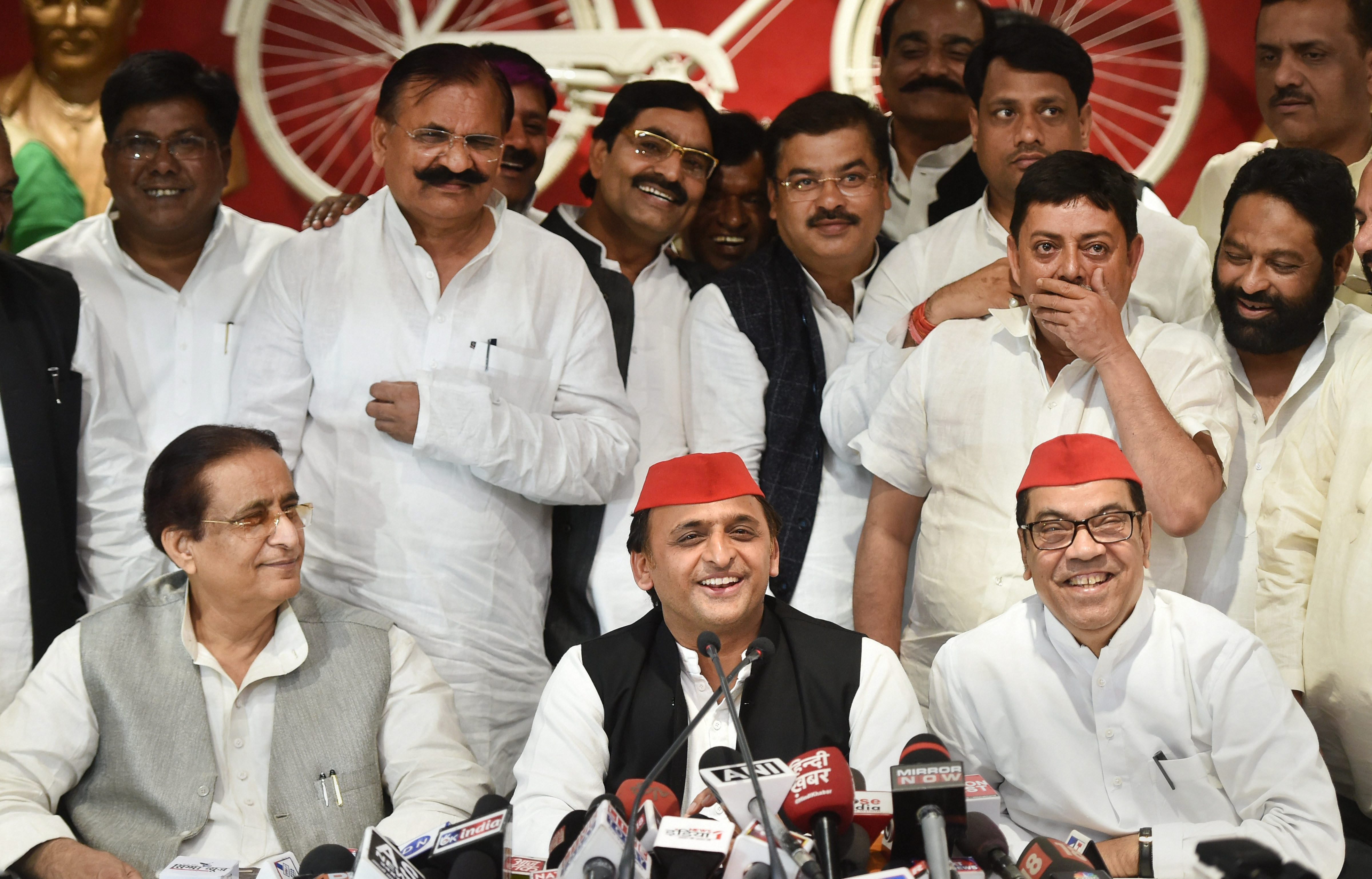 Samajwadi Party presidentAkhilesh Yadav with senior leaders Kiranmoy Nanda and Azam Khan addresses apress conference after the by-election results, at the party headquarters inLucknow on Wednesday. (Photograher: by Nand Kumar/PTI)