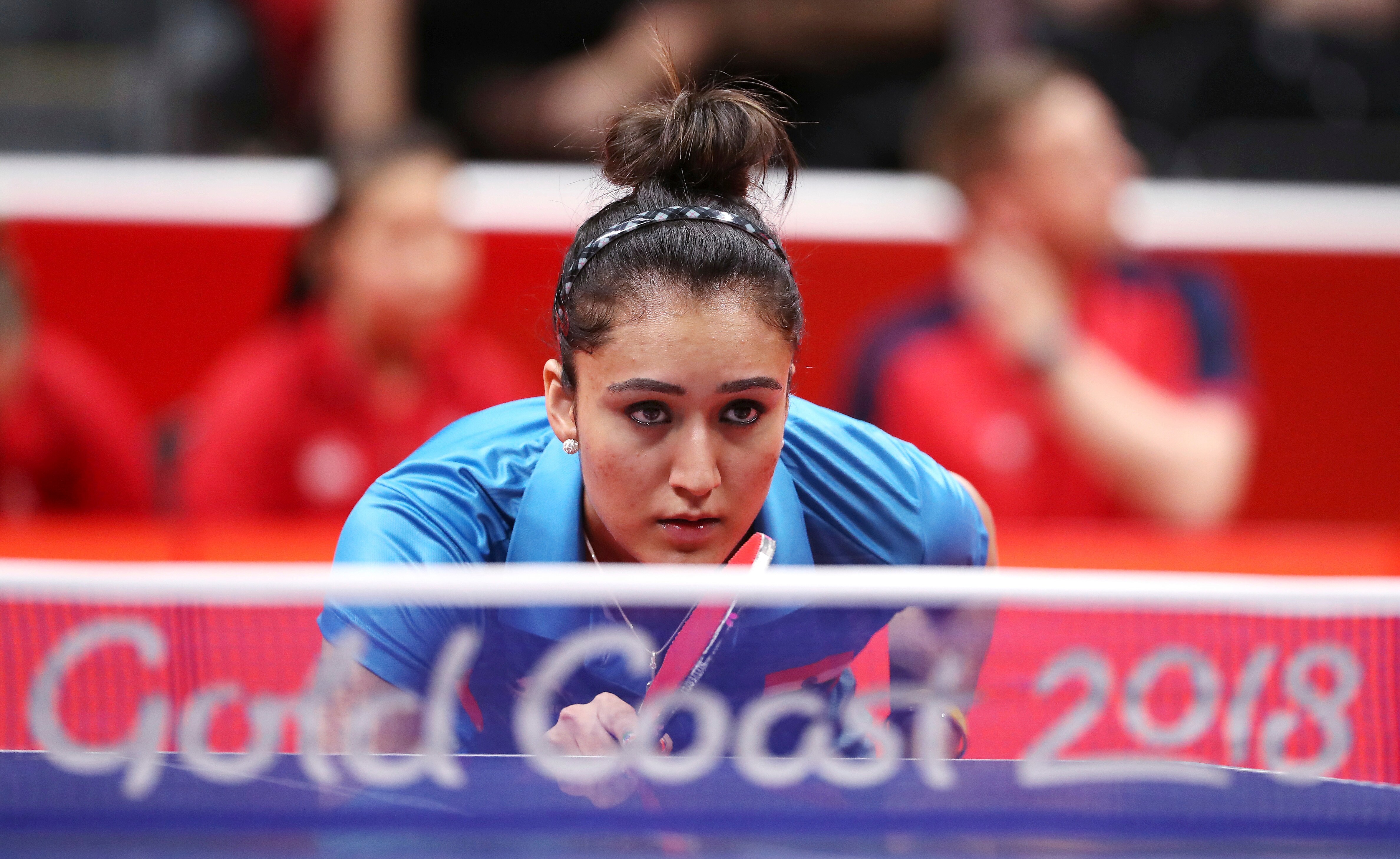India's Manika Batra prepares to return serve while playing Charlotte Carey of Wales during their women's team match the 2018 Commonwealth Games at the Oxenford Studios on the Gold Coast, Australia, Thursday, April 5, 2018.