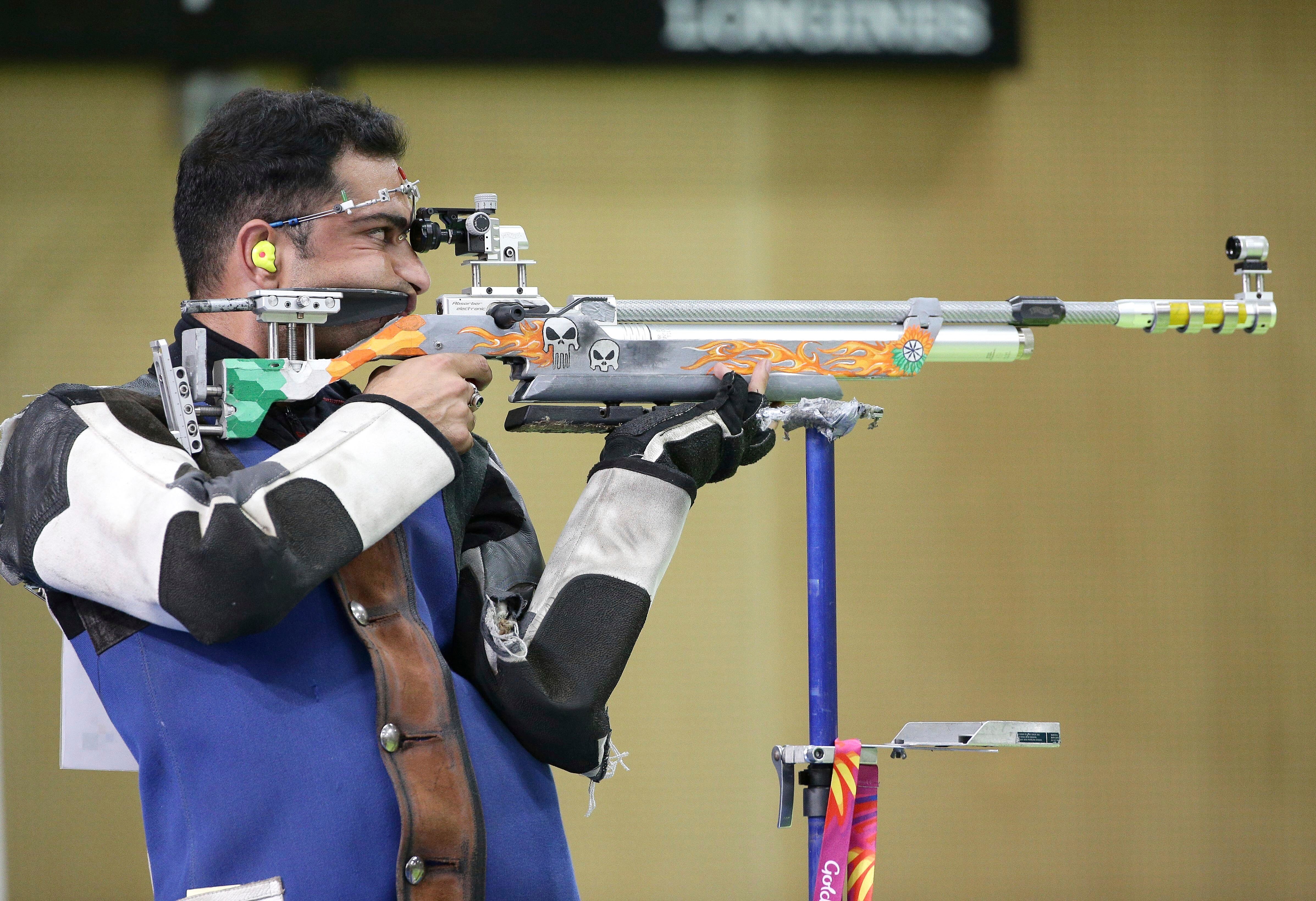 Ravi Kumar of India takes aim during the men's 10m Air Rifle finals at the Belmont Shooting Centre during the 2018 Commonwealth Games in Brisbane, Australia, Sunday, April 8, 2018.