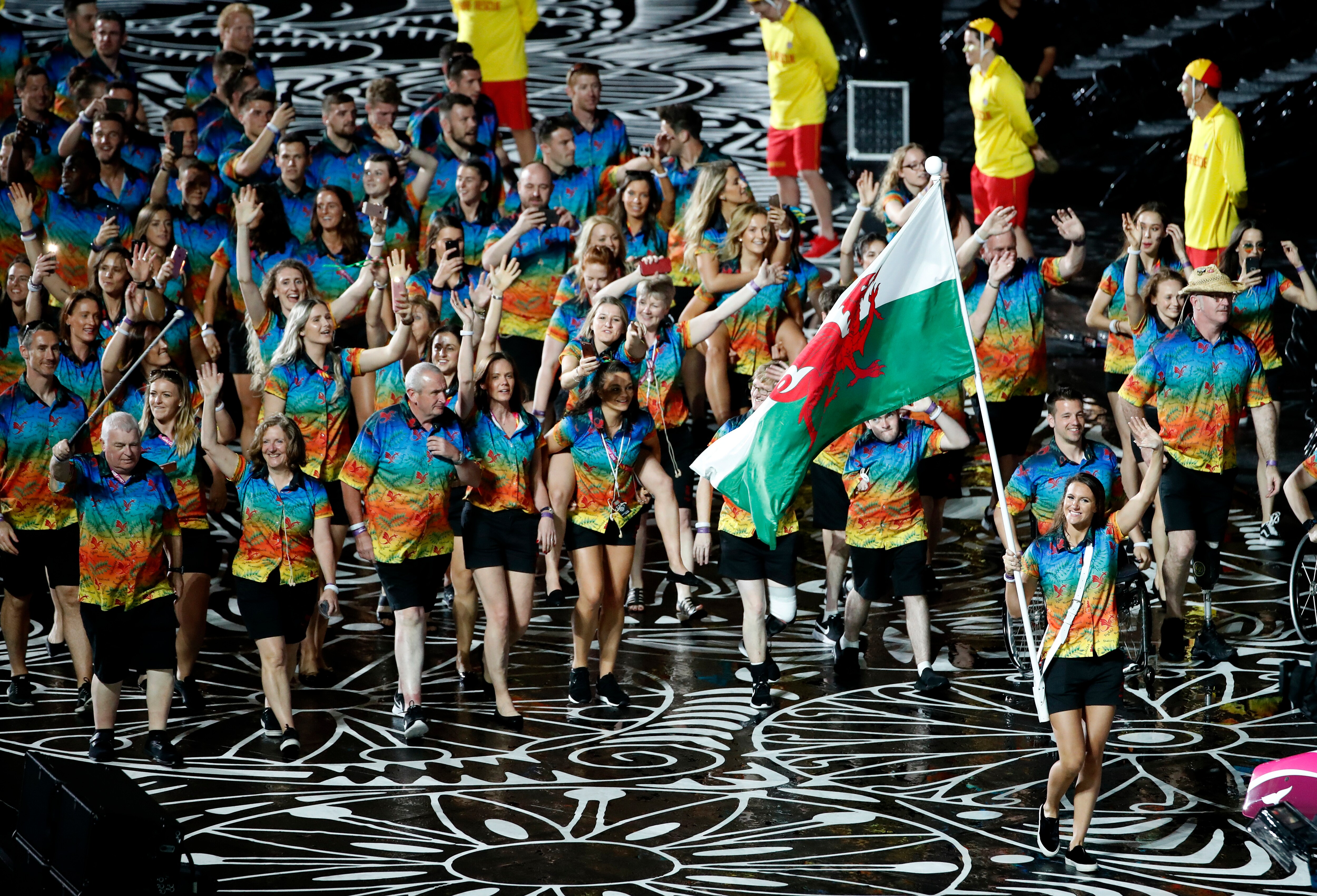 Team Wales flag-bearer Jazz Carlin leads her team into Carrara Stadium for the opening ceremony of the 2018 Commonwealth Games.