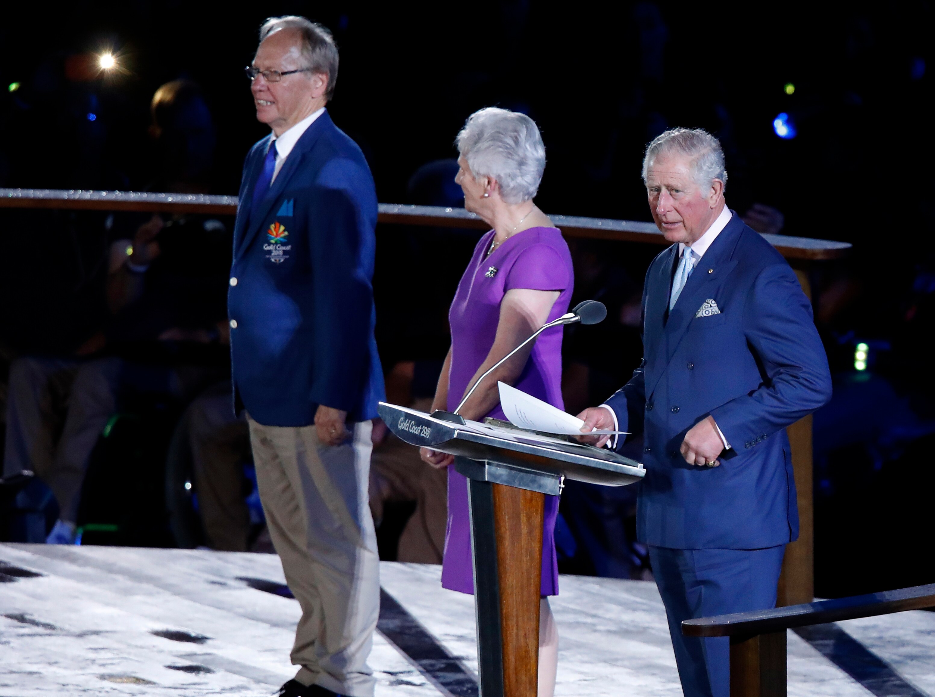 Britain's Prince Charles, right, officially declares the 21st Commonwealth Games open at Carrara Stadium during the opening ceremony.
