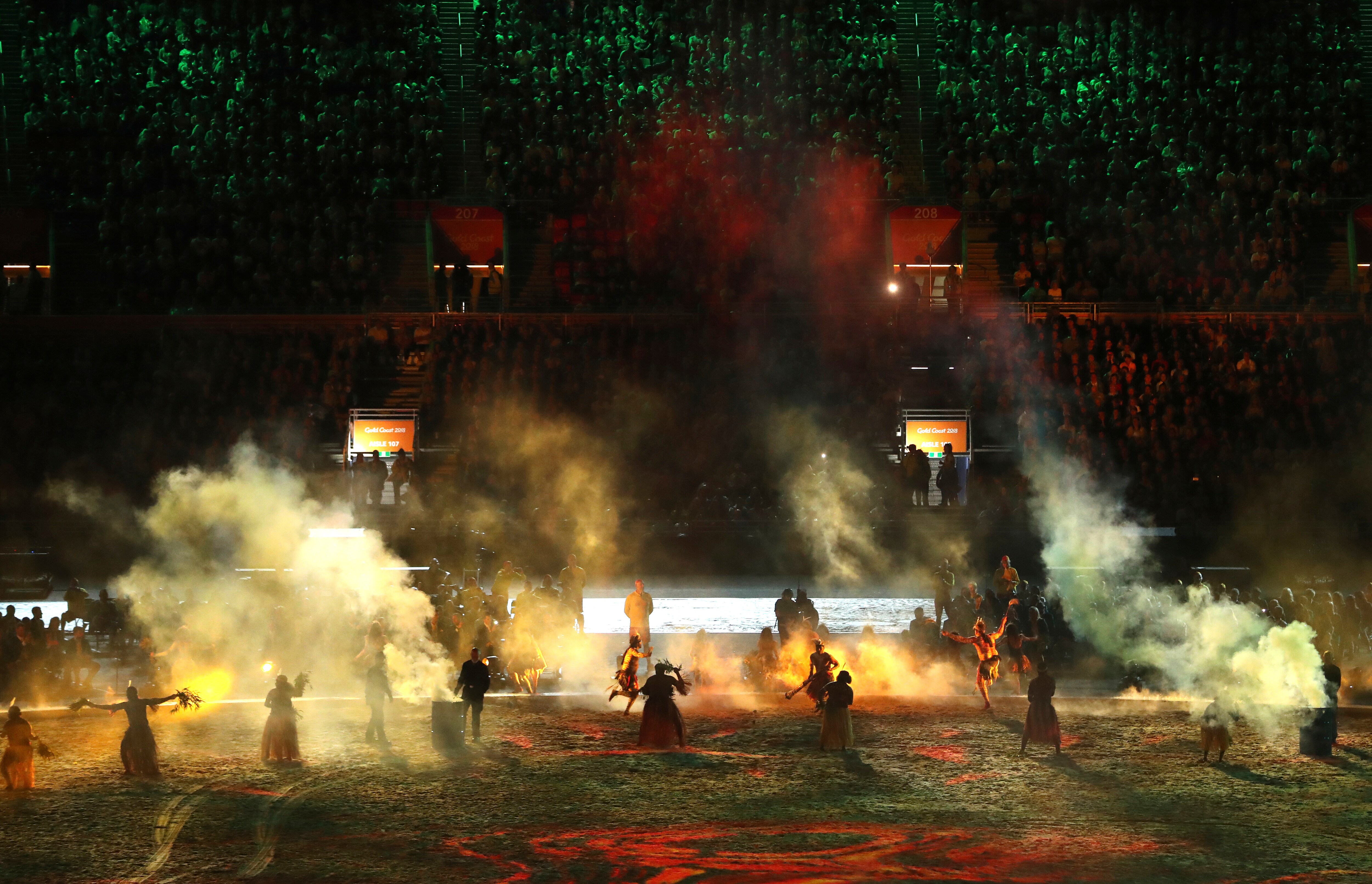 Aborigines perform a smoking ceremony at Carrara Stadium during the opening ceremony for the 2018 Commonwealth Games.