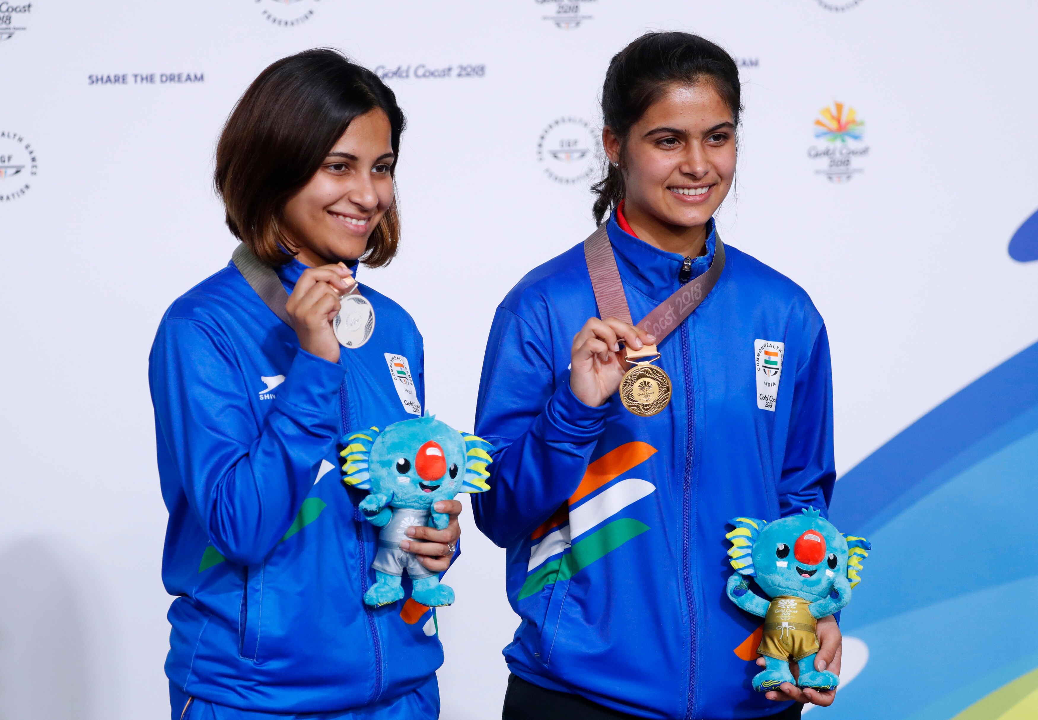 Manu Bhaker and Heena Sidhu with their medals after the Women's Air Pistol 10m final at 2018 CWG.