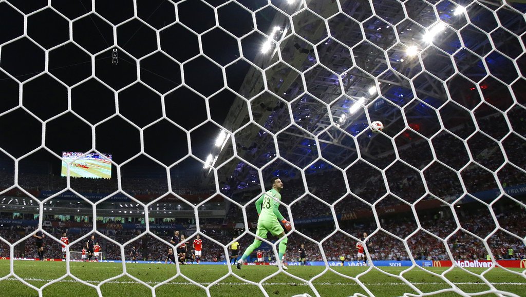 Croatian keeper Danijel Subasic watches Denis Cheryshev's shot fly past him into the back of the net