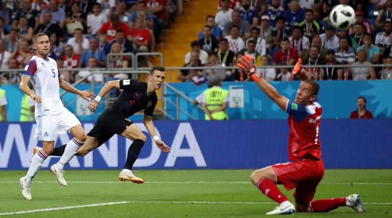 Ivan Perisic shoots past Iceland goalkeeper Halles Halldorsson in the 90th minute to maintain Croatia's win streak