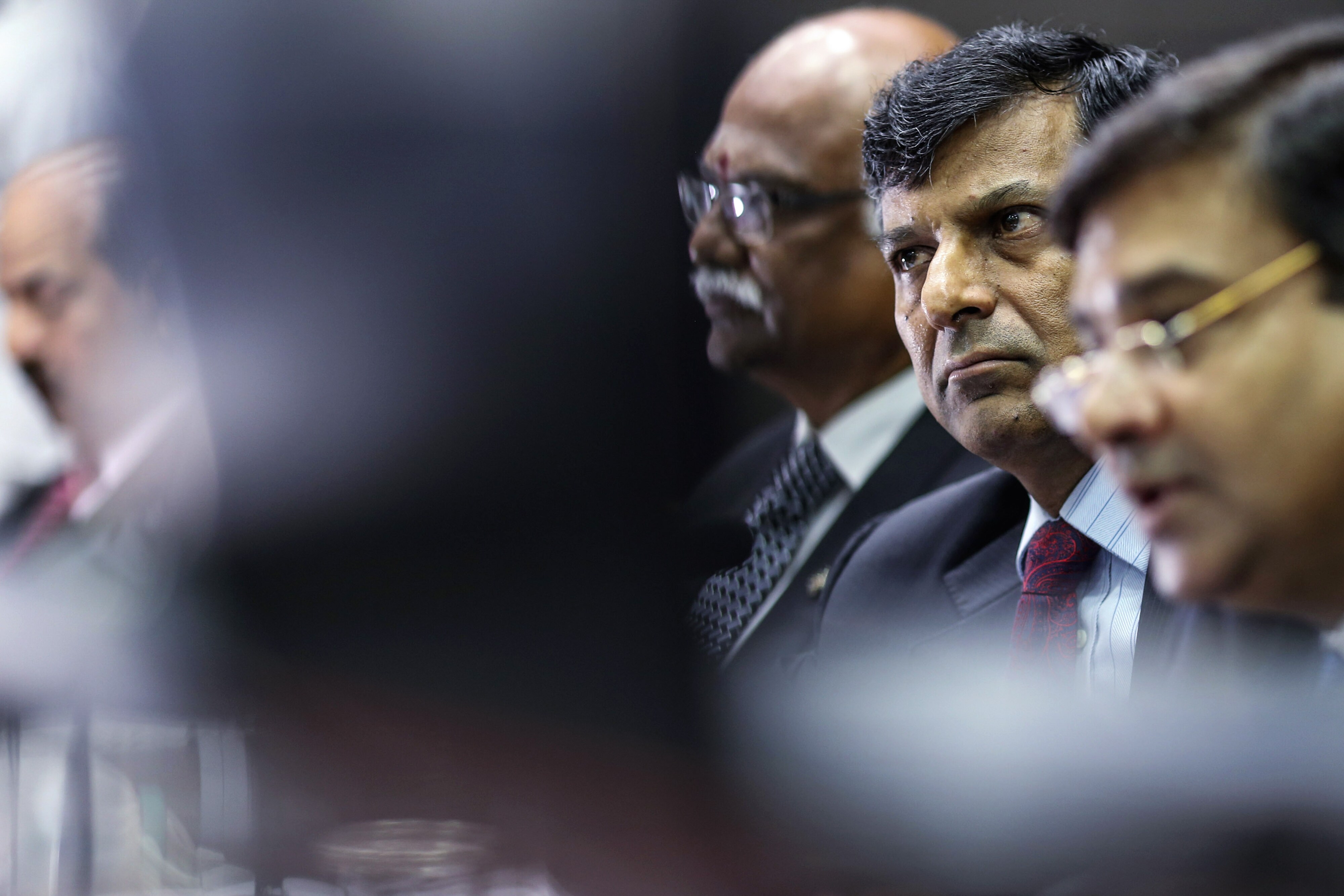 Raghuram Rajan, then governor of the RBI, centre, with then deputy governors R Gandhi and Urjit Patel, in Mumbai, India, on Aug. 9, 2016. (Photographer: Dhiraj Singh/Bloomberg)