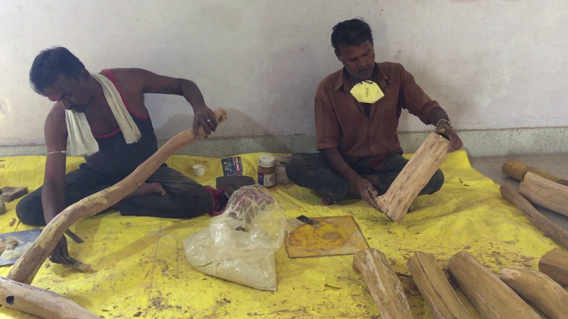 Artisans prepare logs of sandalwood before it's processed into various shapes at Rural Artisans Craft Centre in Metagalli, Mysuru. (Photographer: Nishant Sharma/BloombergQuint)