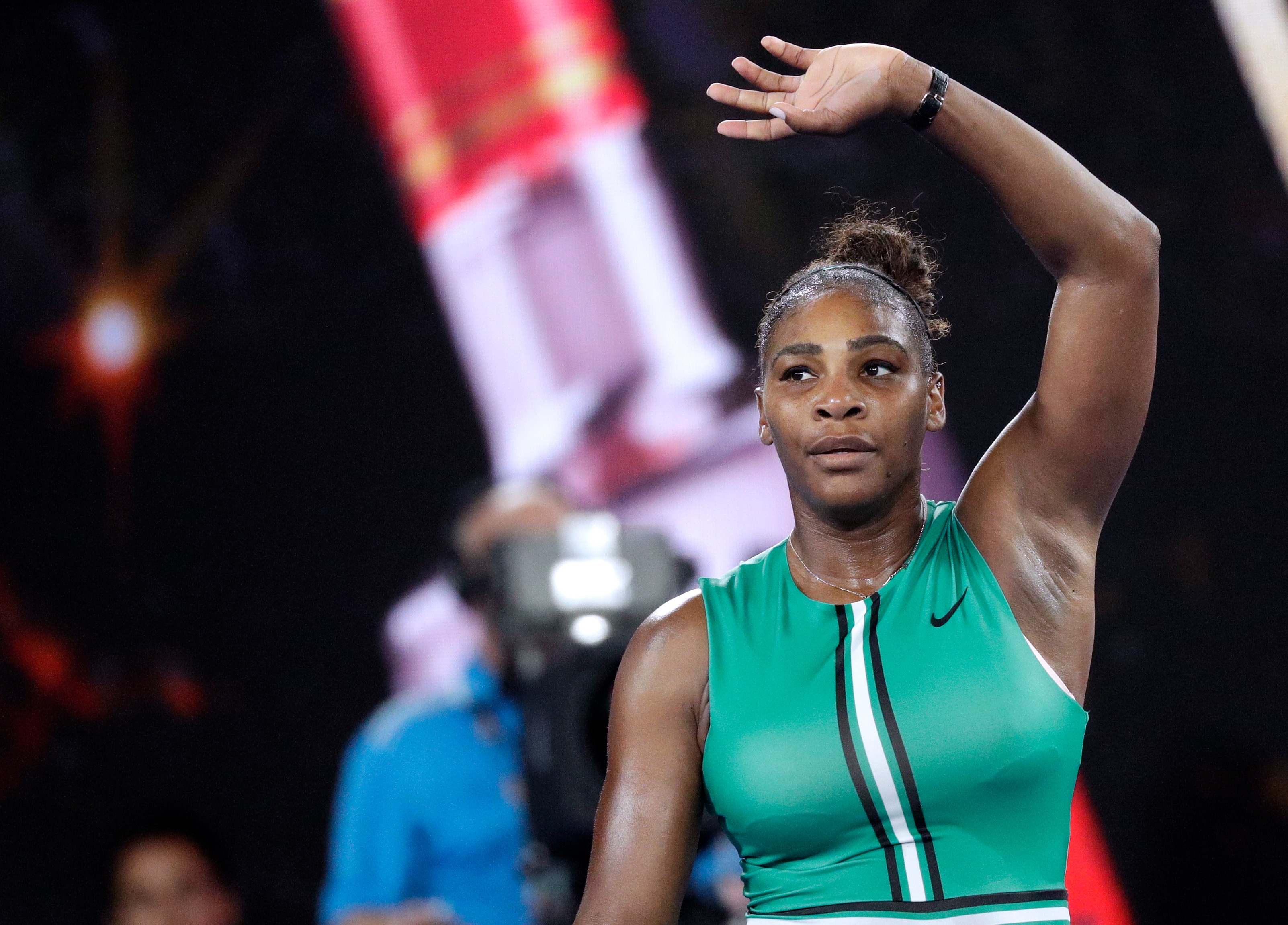 Serena Williams waves to the crowds after winning her fourth round match at the 2019 Australian Open.