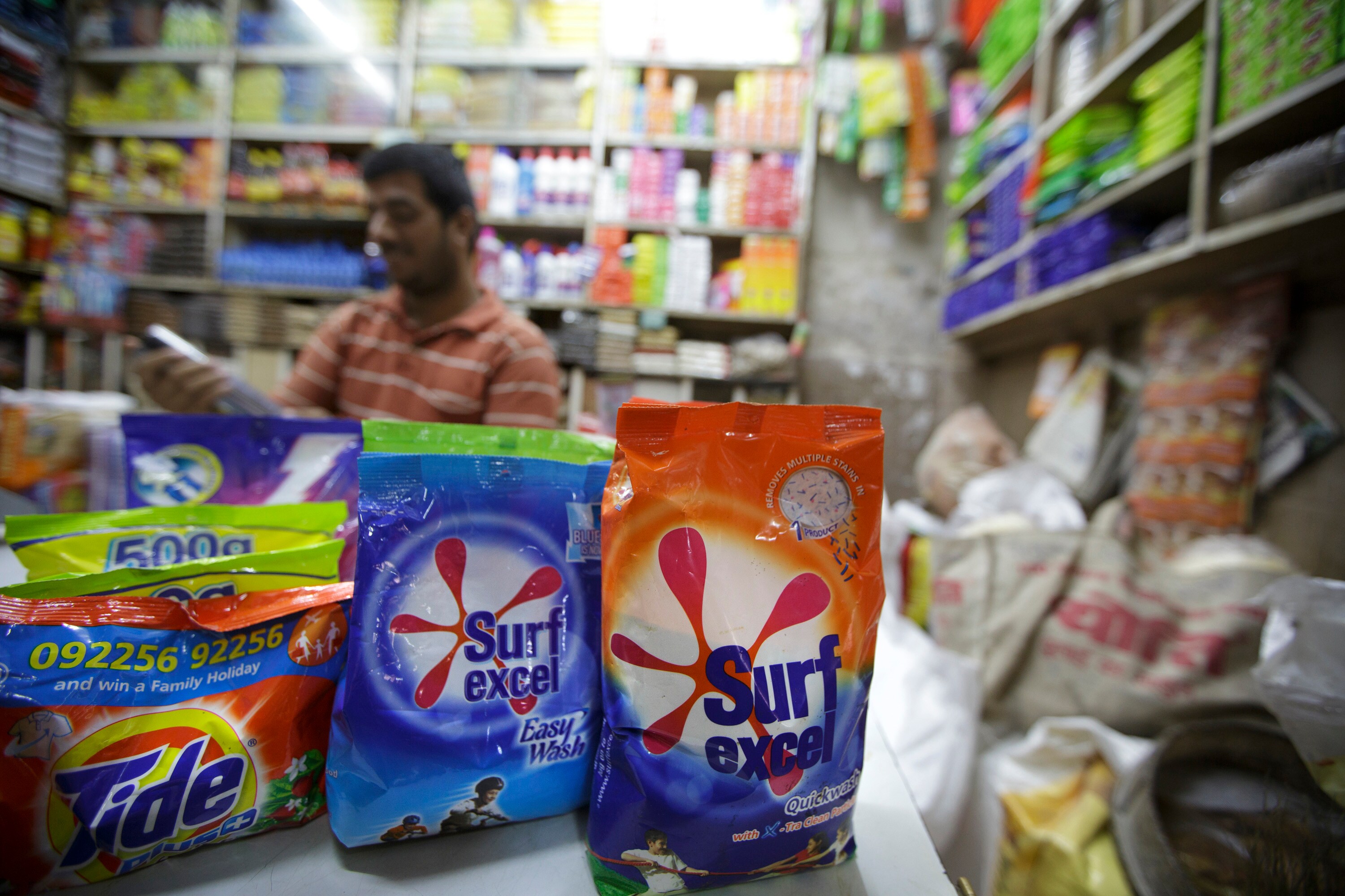 Packages of Hindustan Unilever Ltd. Surf excel laundry detergent are displayed for sale at a store in Mumbai. ( Photographer: Kuni Takahashi/Bloomberg)